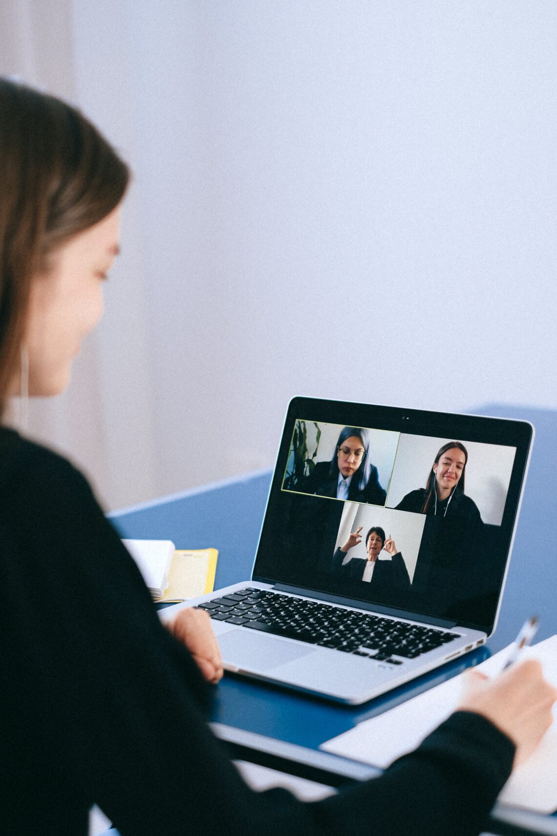 a woman on a zoom meeting